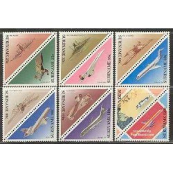 12 عدد تمبر مثلثی هواپیماها - سورینام 1987
